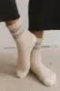 Fuzzy Striped Socks in Beige sold by bohme