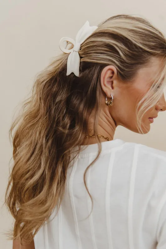 Oversized Bow Claw Clip in White sold by bohme