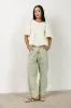 Alessia Peplum Top in Cream sold by bohme
