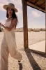 Addey Knit Overalls in Cream sold by bohme