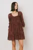 Miles Smocked Mini Dress in Red-Brown sold by bohme