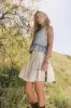 Skyler Tiered Mini Skirt in Cream sold by bohme