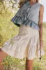 Skyler Tiered Mini Skirt in Cream sold by bohme