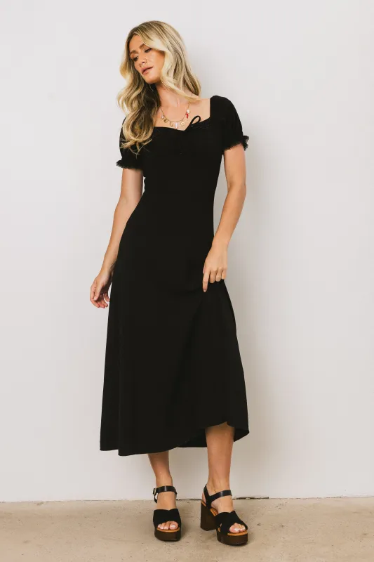 Maddox Midi Dress in Black sold by bohme