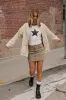 Kiara Studded Mini Skirt sold by bohme