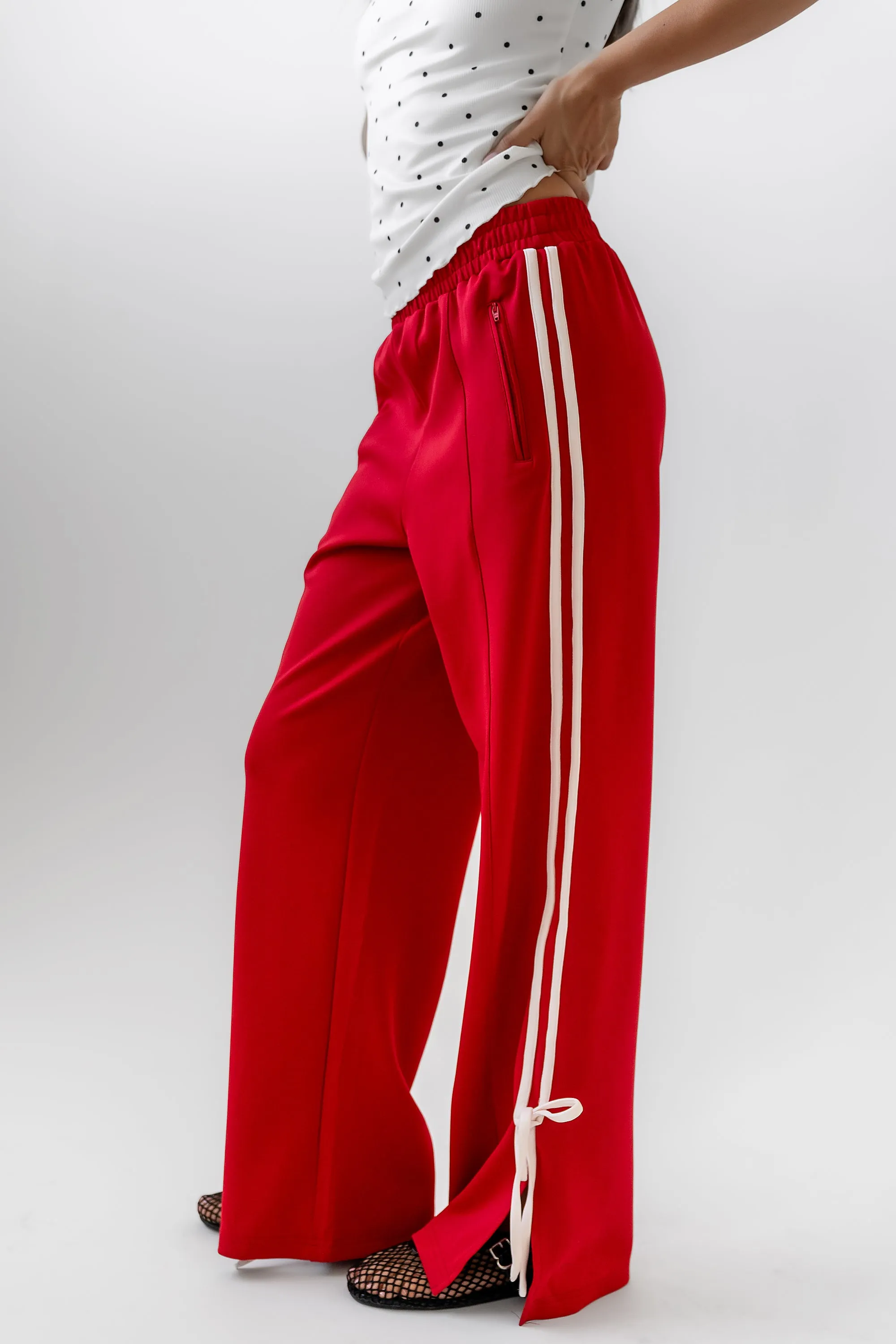 Astrid Track Pants in Red sold by bohme