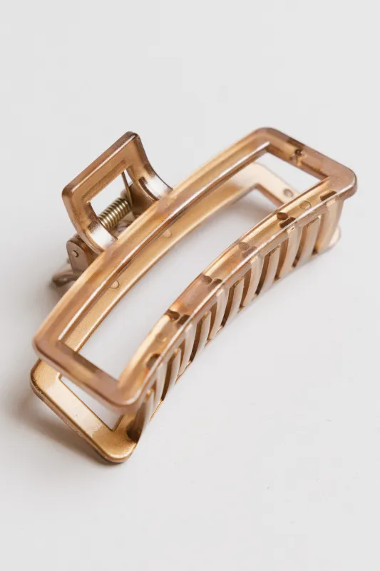 Abstract Cutout Claw Clip in Beige sold by bohme