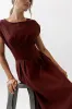 Matilda Pleated Maxi Dress in Rust sold by bohme