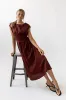 Matilda Pleated Maxi Dress in Rust sold by bohme