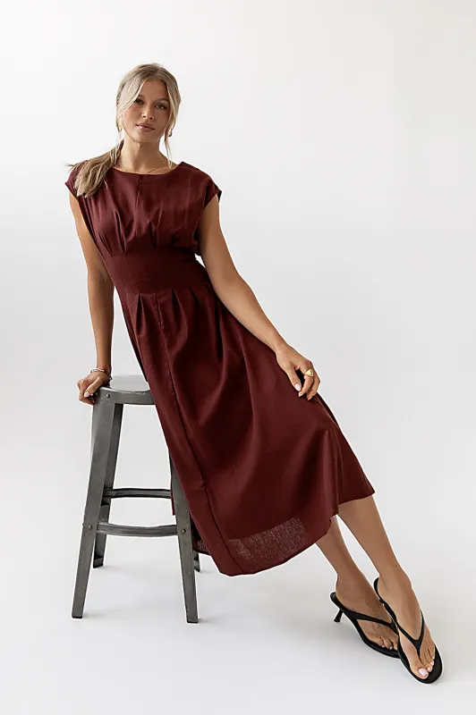 Matilda Pleated Maxi Dress in Rust sold by bohme