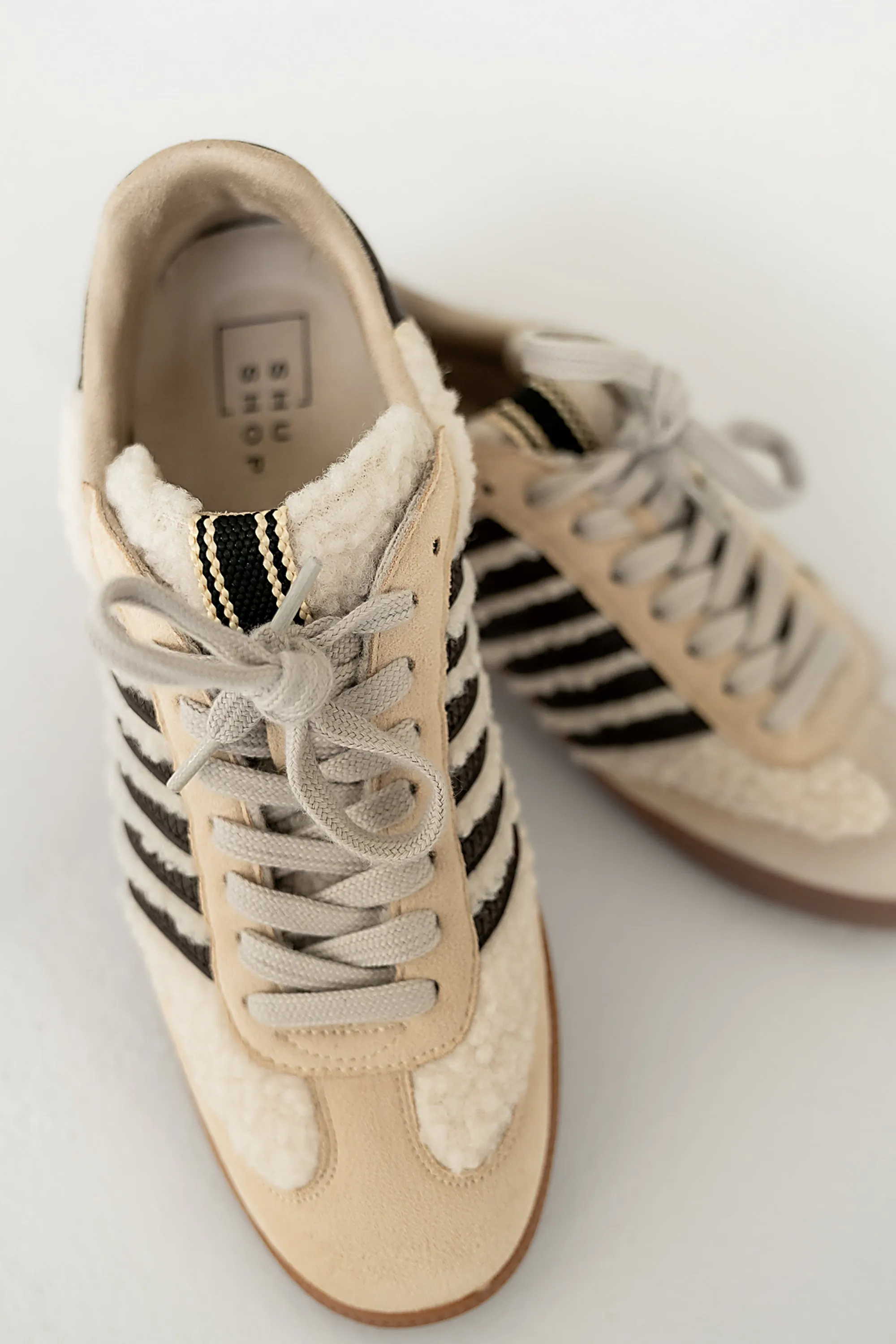 Stevie Striped Sneaker in Beige Shearling sold by bohme