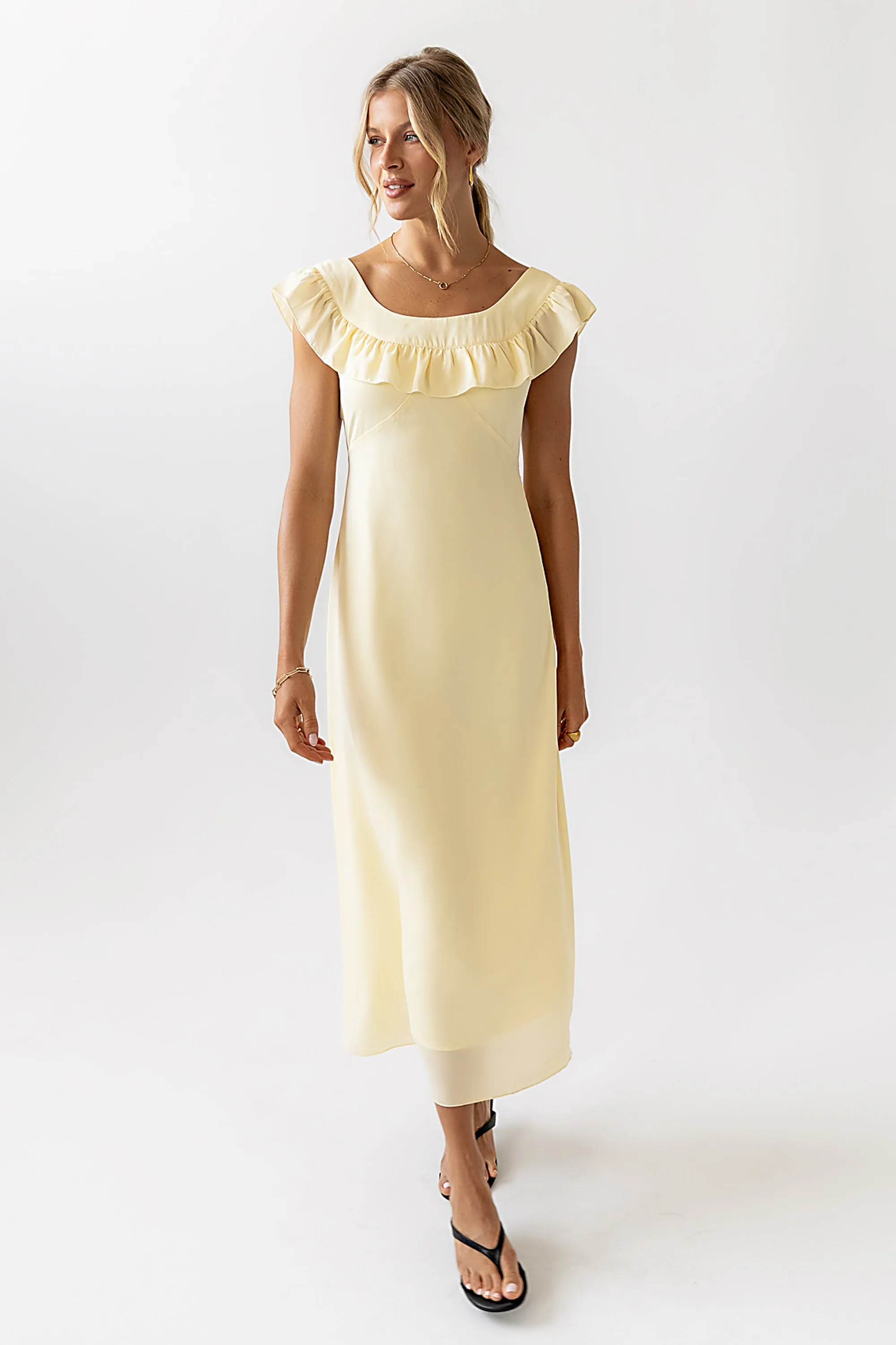 Lydia Ruffle Maxi Dress in Yellow sold by bohme