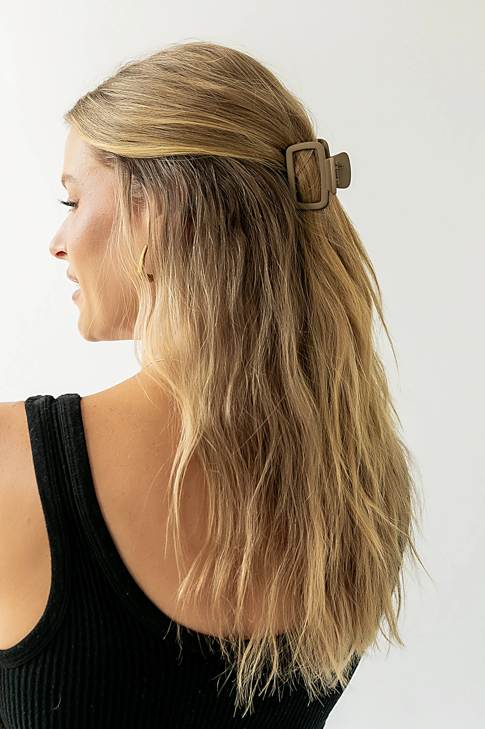 Tati Cutout Claw Clip in Brown sold by bohme