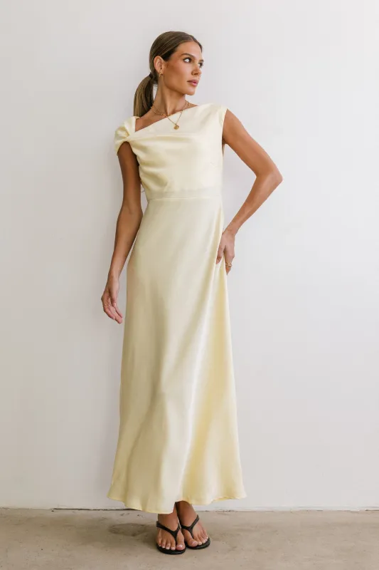 Rodney Asymmetrical Maxi Dress in Yellow sold by bohme
