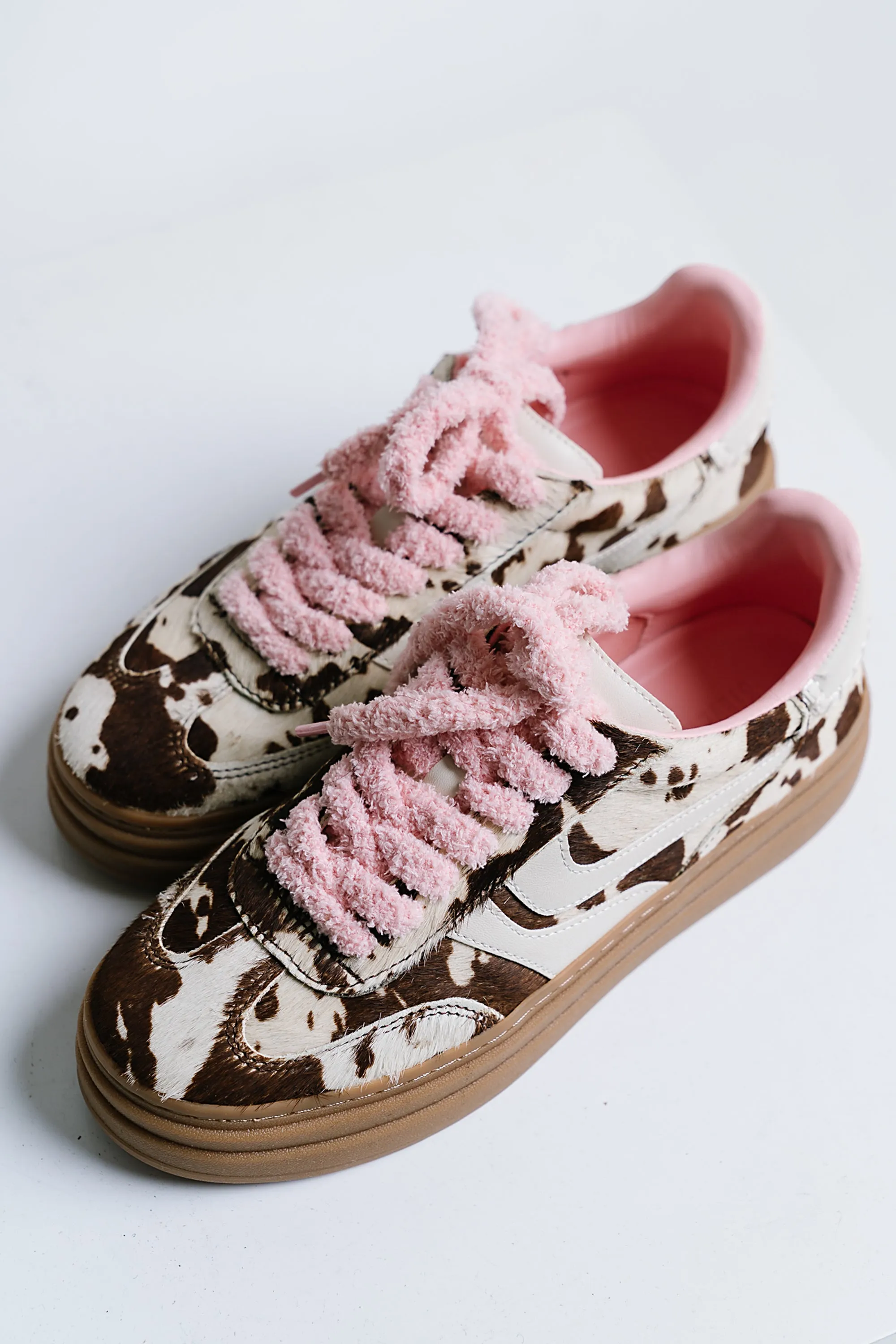Steve Madden Dodge Sneaker in Cow Print sold by bohme