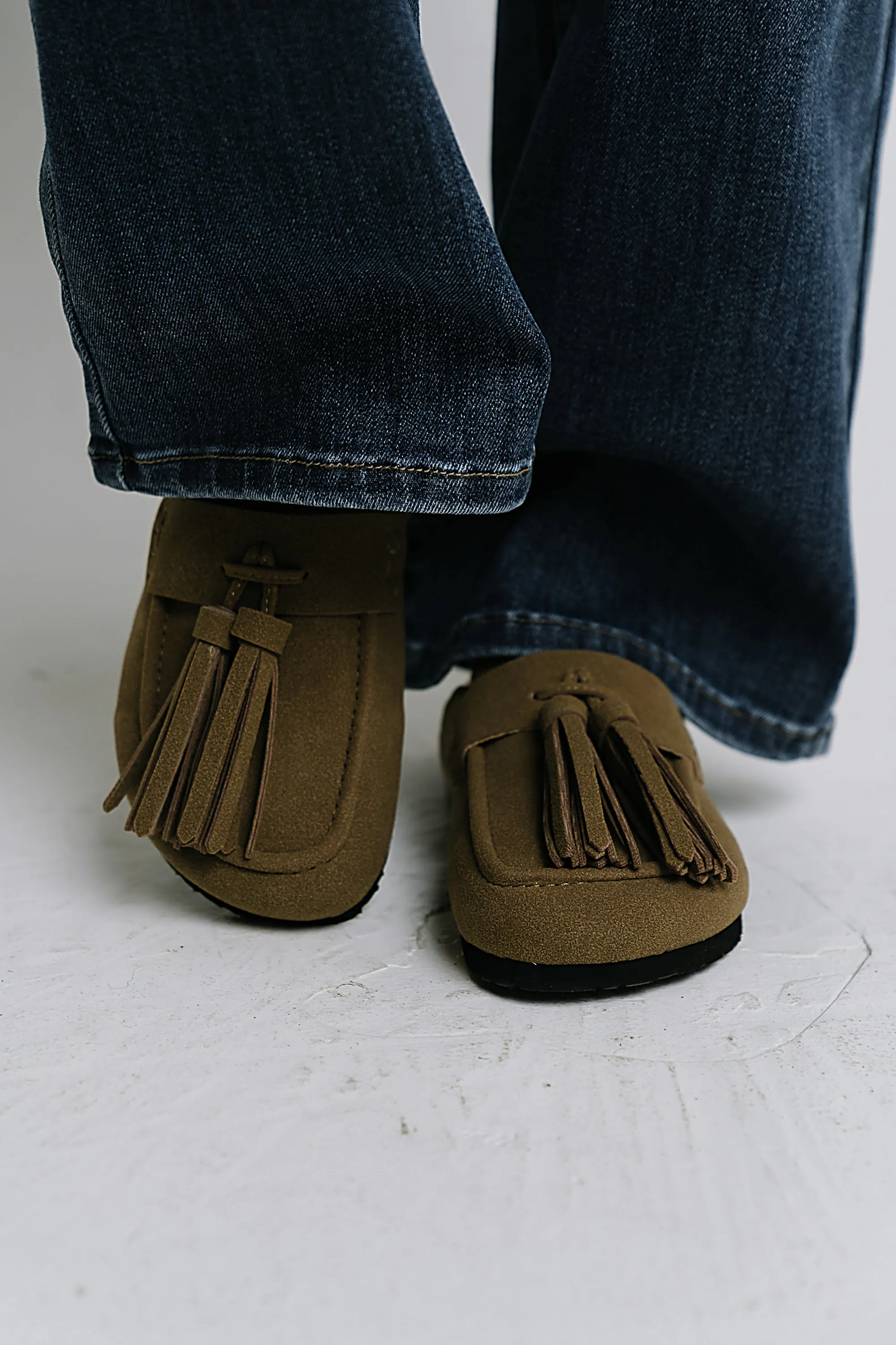 Ariana Tassel Clogs sold by bohme