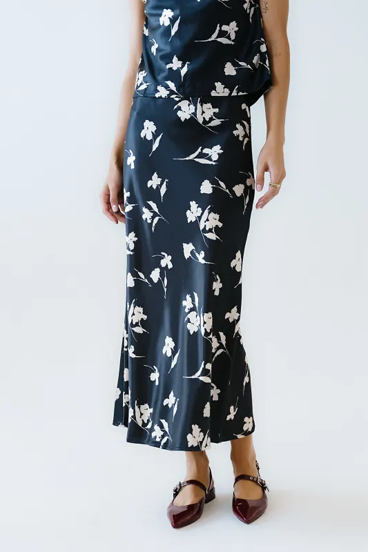 Carsyn Floral Maxi Skirt in Black sold by bohme
