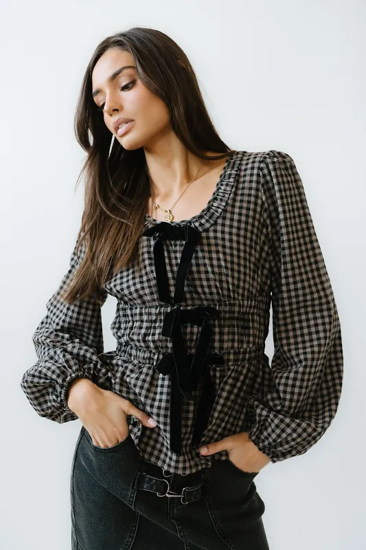 Ella Tie Peplum Blouse in Black sold by bohme