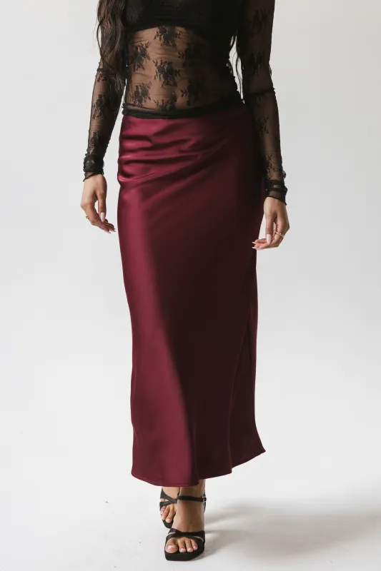 Tory Satin Maxi Skirt in Burgundy sold by bohme