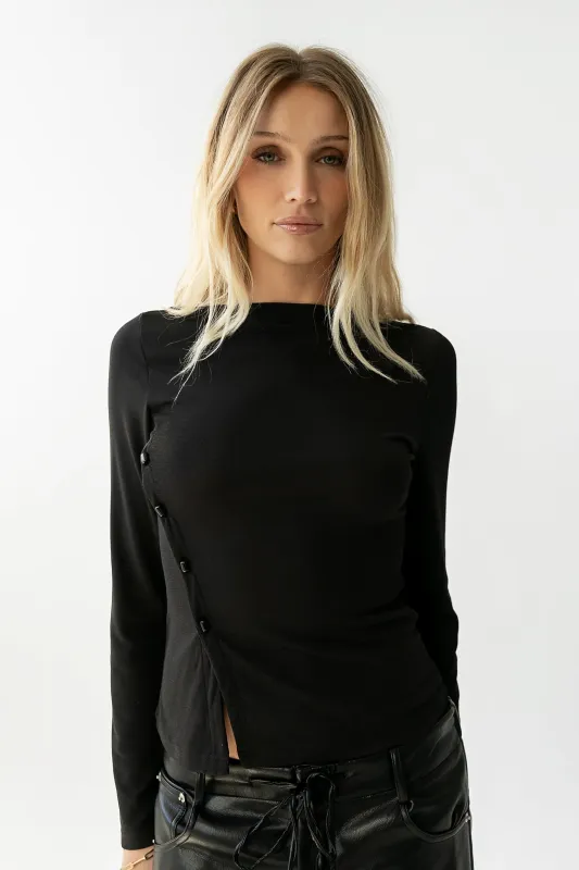 Ariya Asymmetrical Top in Black sold by bohme
