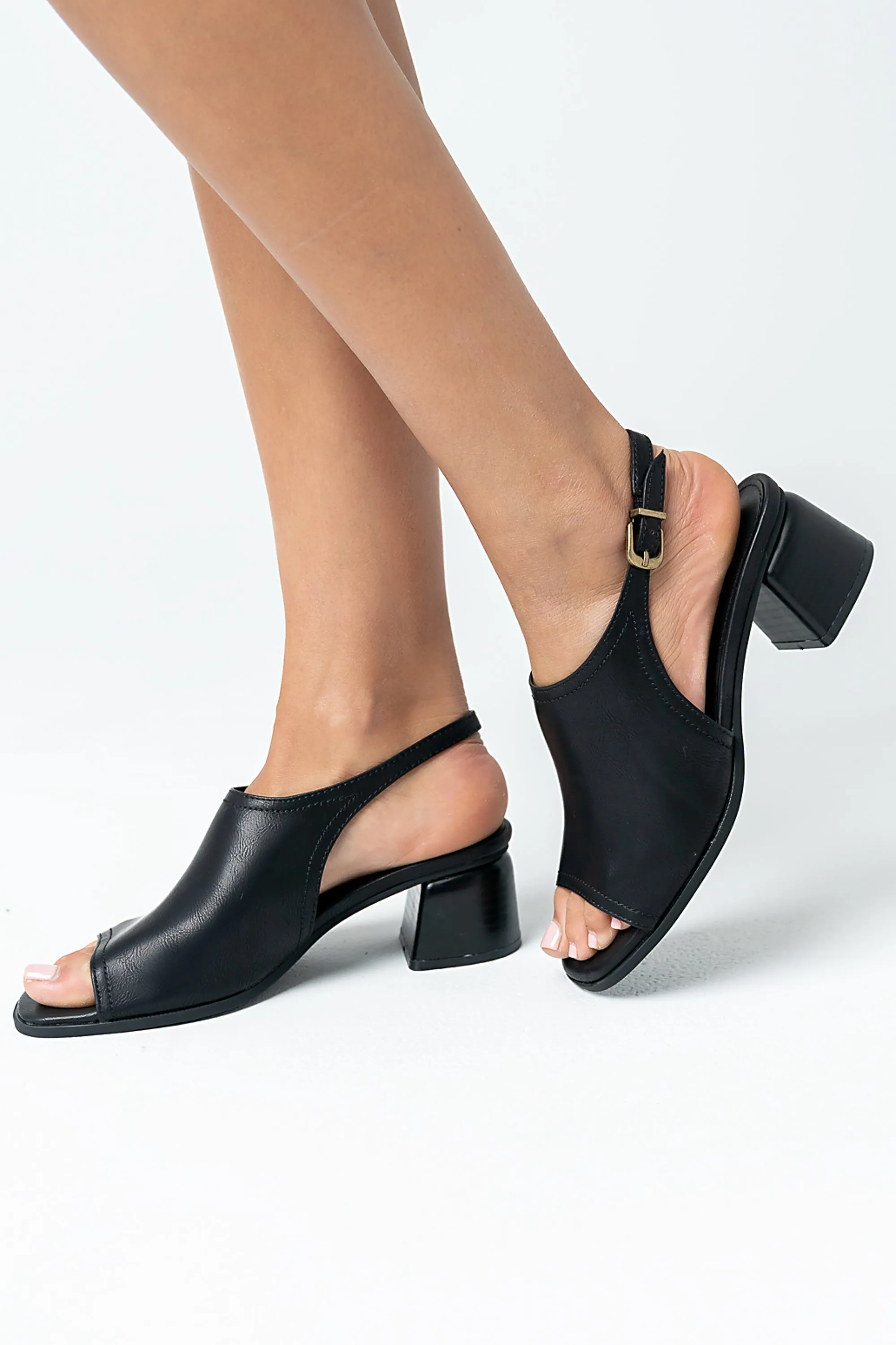 Faith Slingback Mule in Black sold by bohme