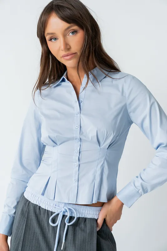 Brecken Pleated Button Up in Light Blue sold by bohme