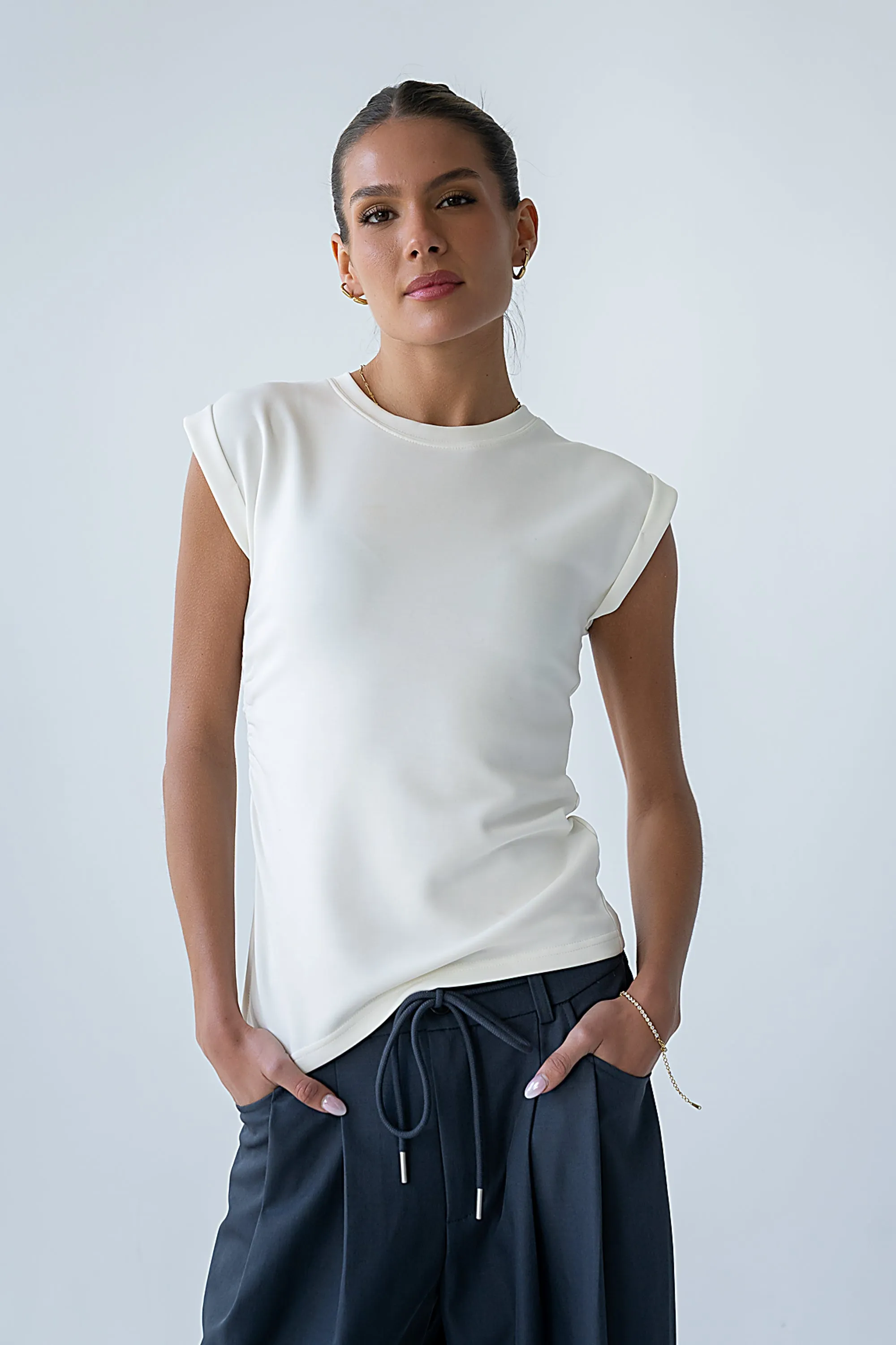 Johny Asymmetrical Top in White sold by bohme