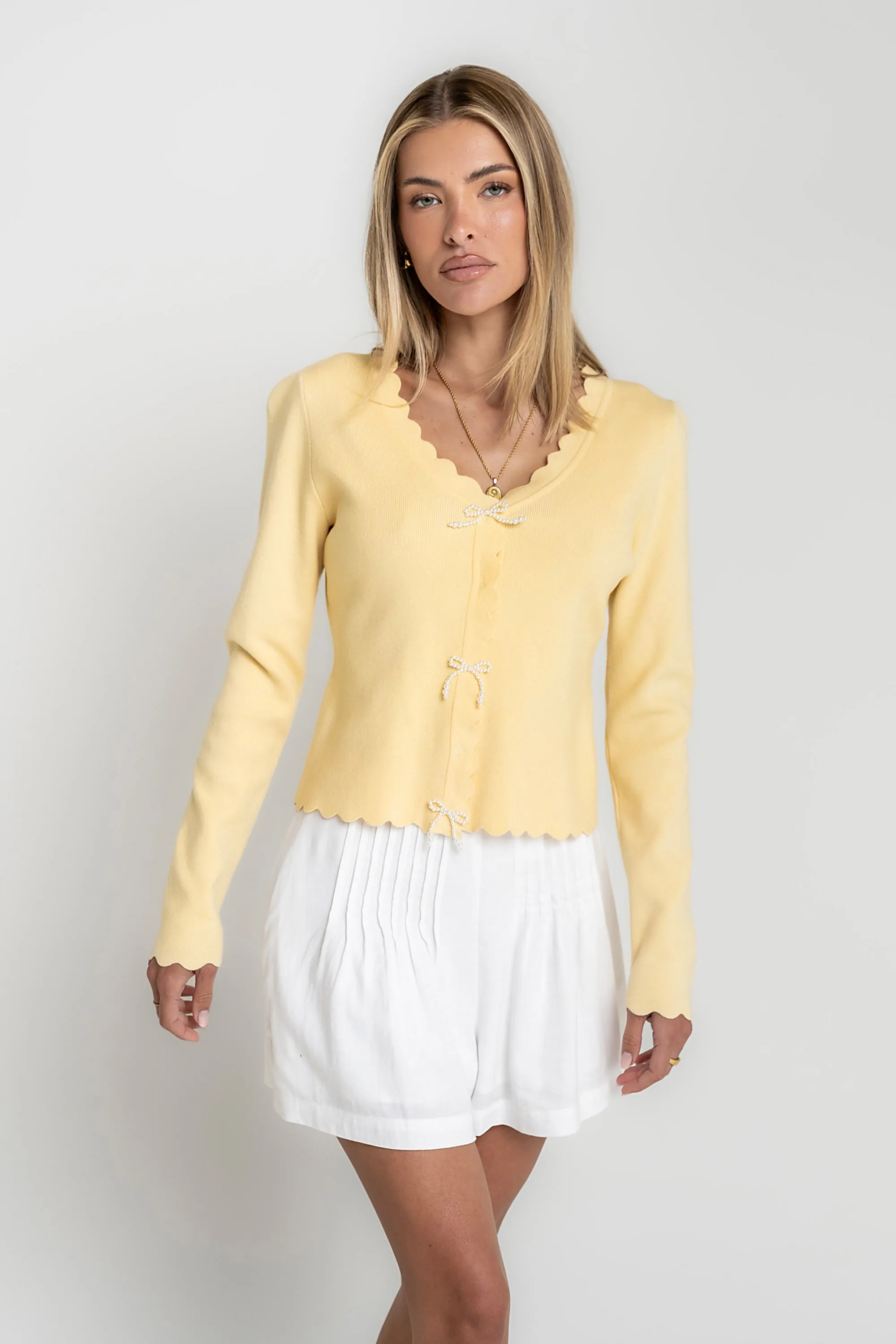 Suzy Scalloped Sweater in Yellow sold by bohme
