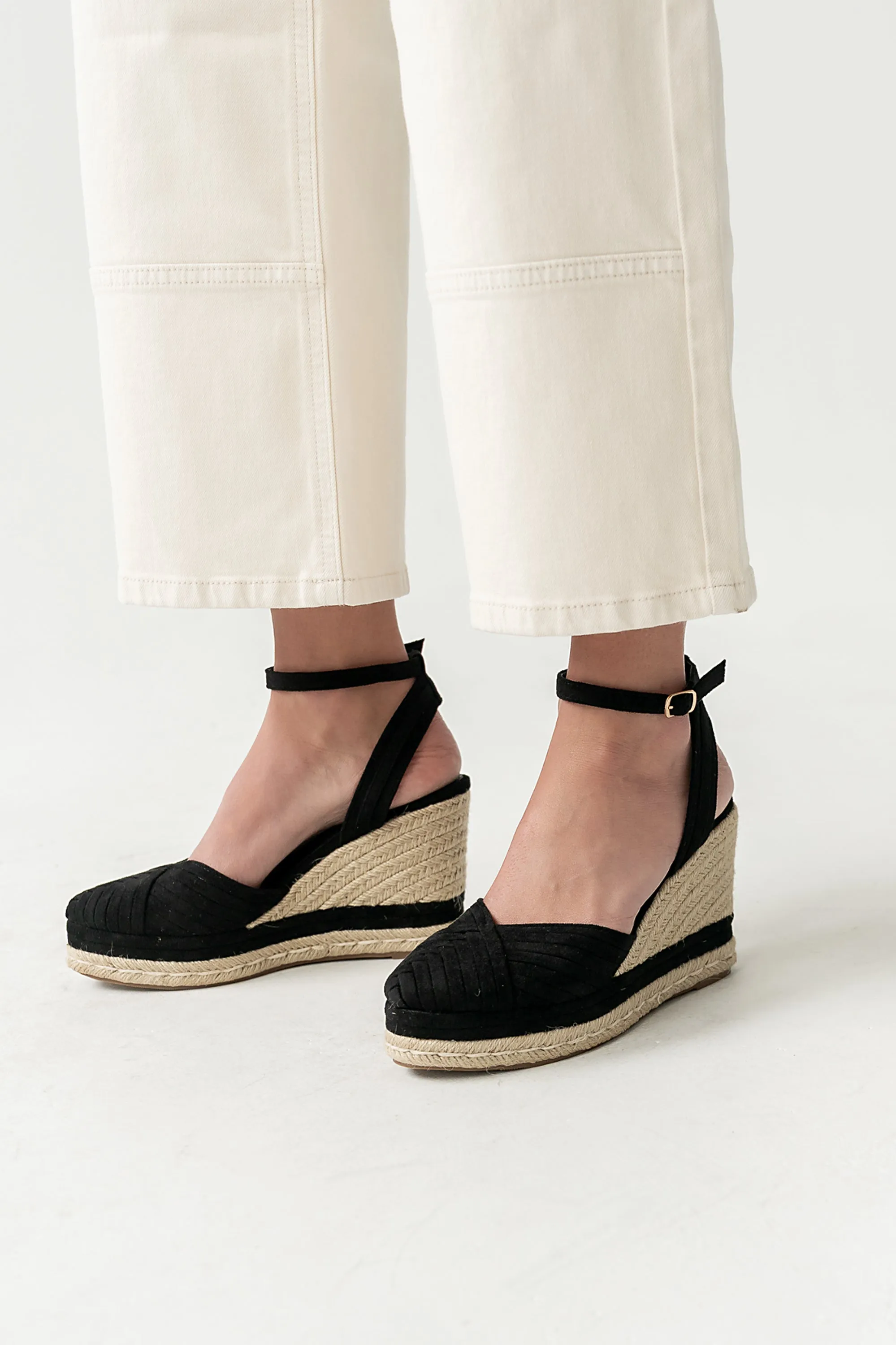 Becca Wedge Sandal in Black sold by bohme