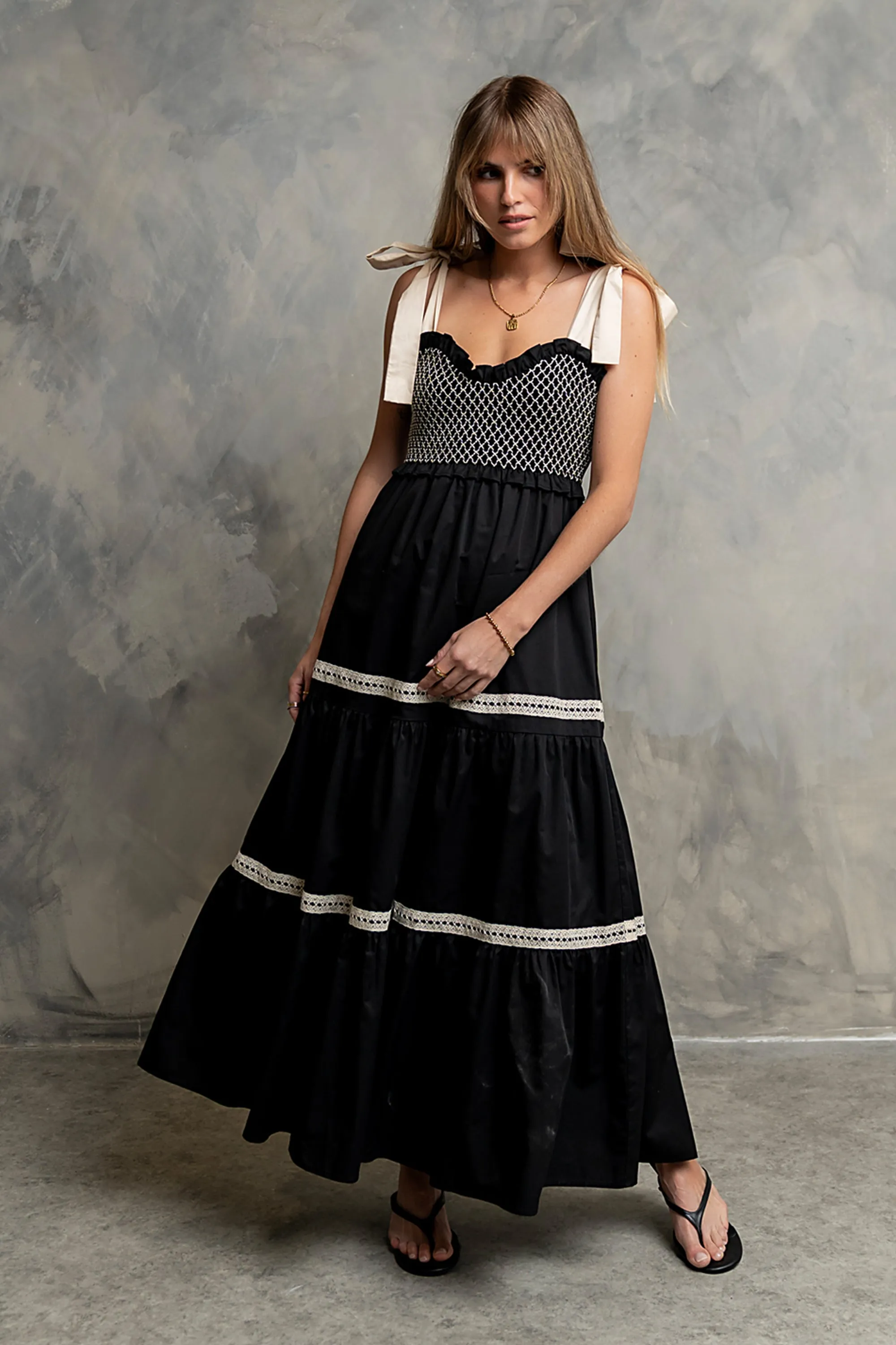 Mollie Tiered Maxi Dress in Black sold by bohme