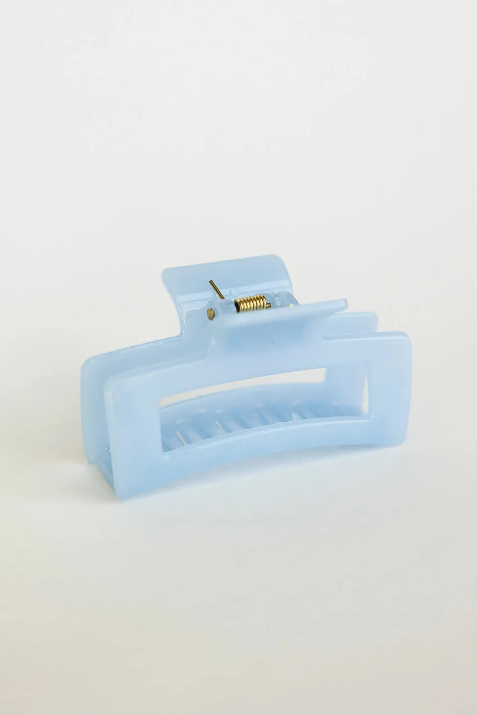 Translucent Rectangle Claw Clip in Blue sold by bohme