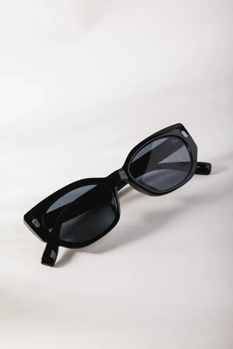 Marica Sunglasses in Black sold by bohme