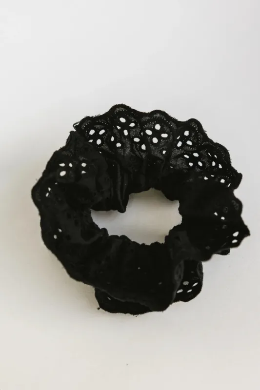 Floral Lace Scrunchie in Black sold by bohme