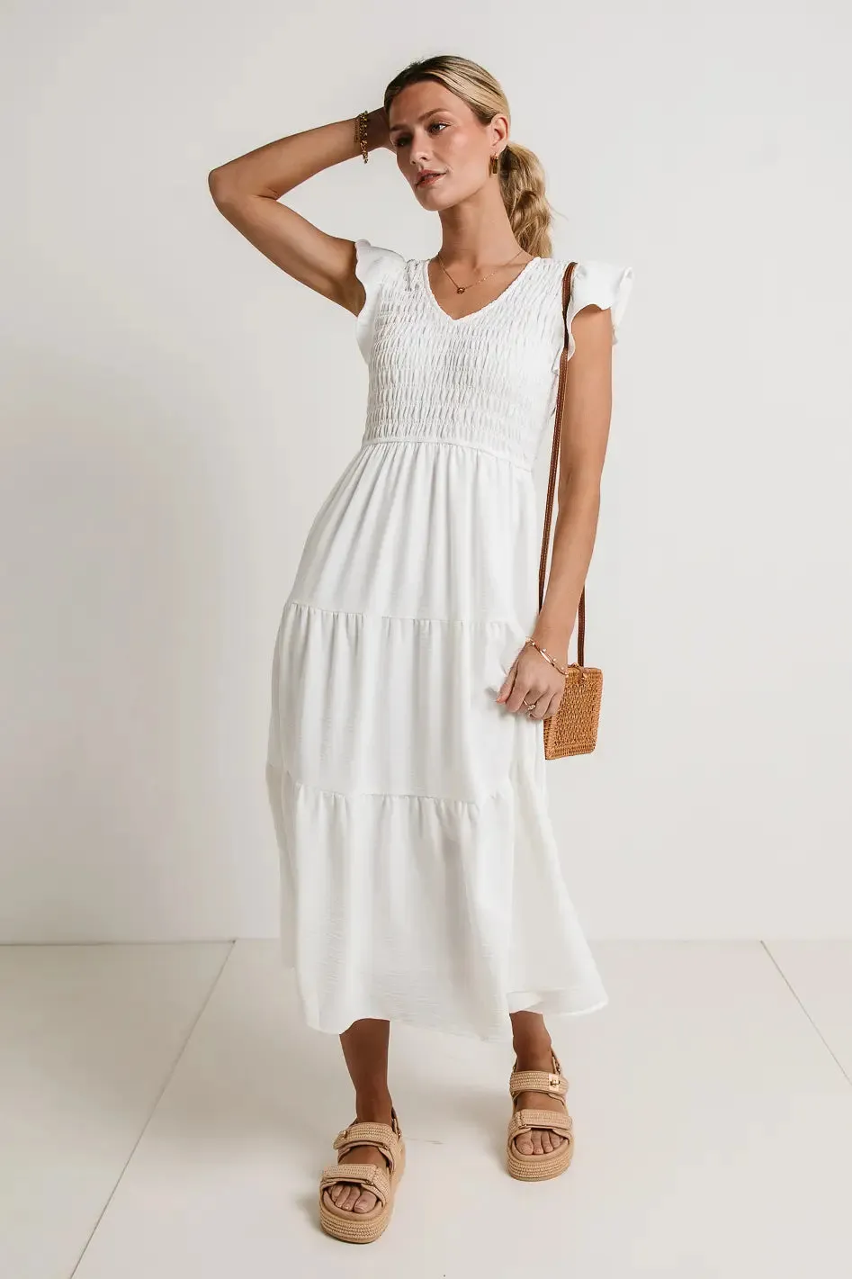 Rain Smocked Midi Dress in White sold by bohme