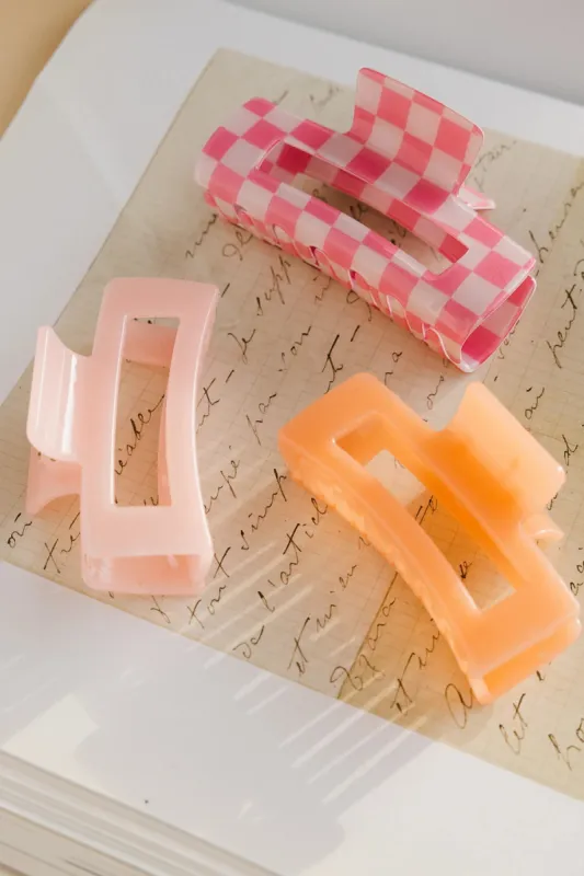 Translucent Rectangle Claw Clip in Peach sold by bohme