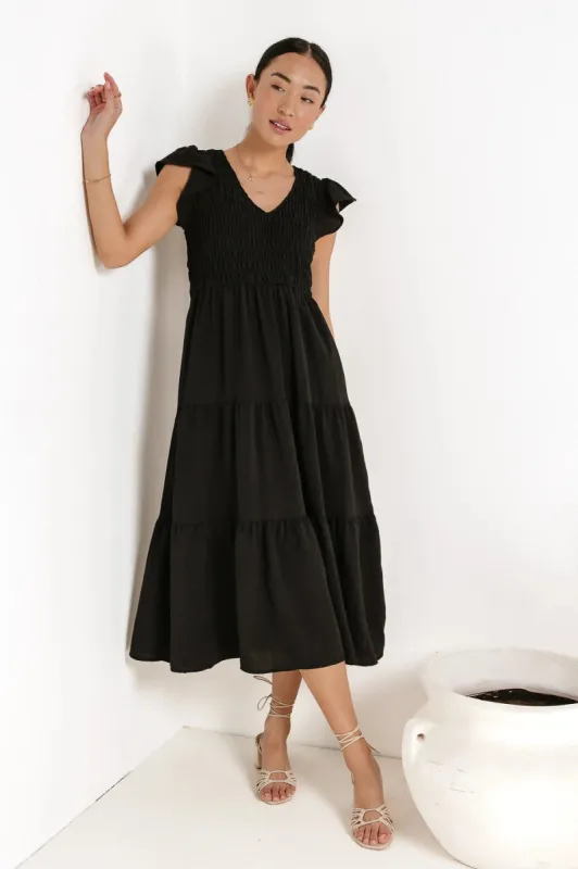 Rain Smocked Midi Dress in Black sold by bohme