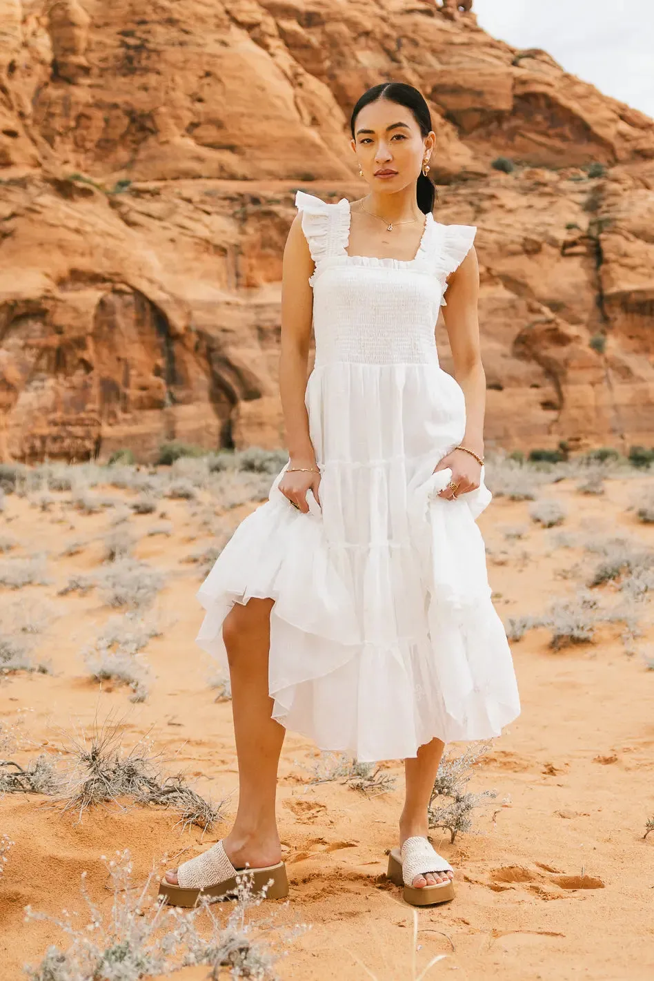 Floral Embroidered Smocked Dress in Cream sold by bohme