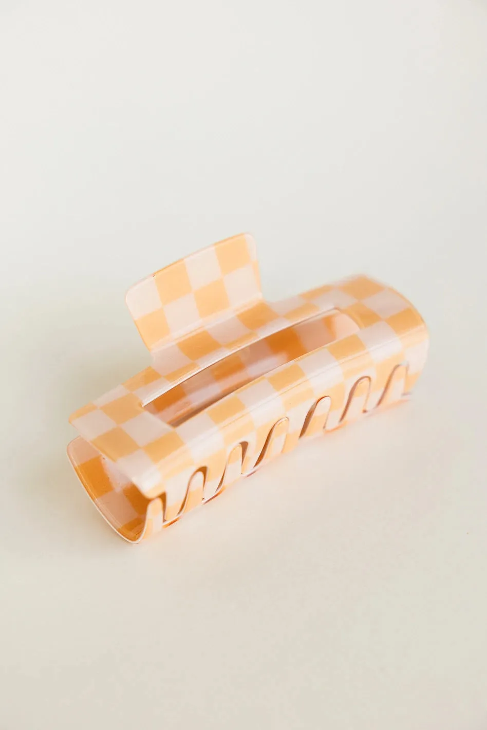 Checkered Rectangle Claw Clip in Peach sold by bohme