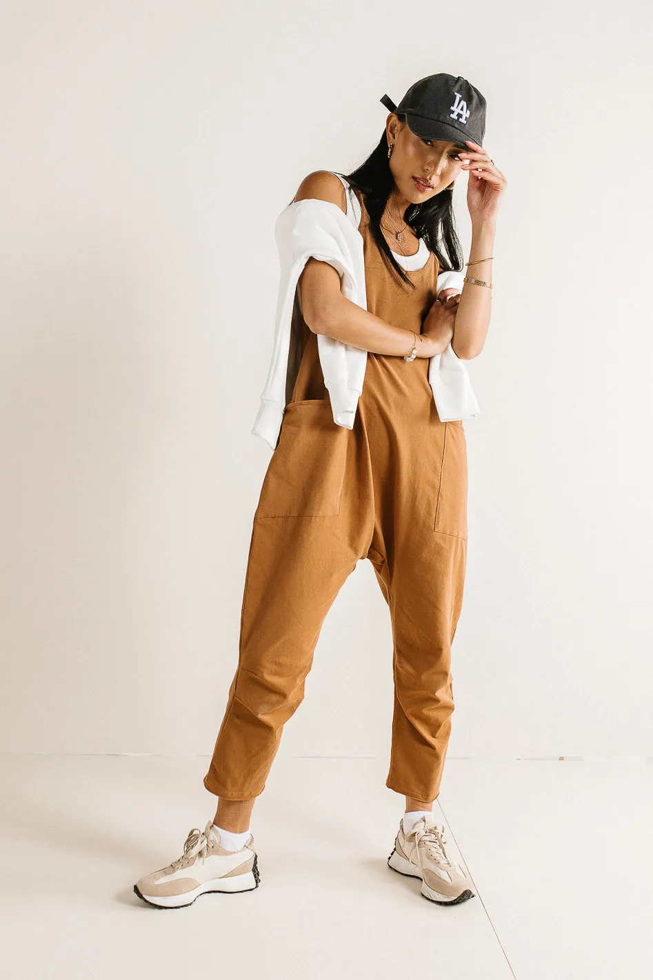Don't Stop Onesie in Brown sold by bohme