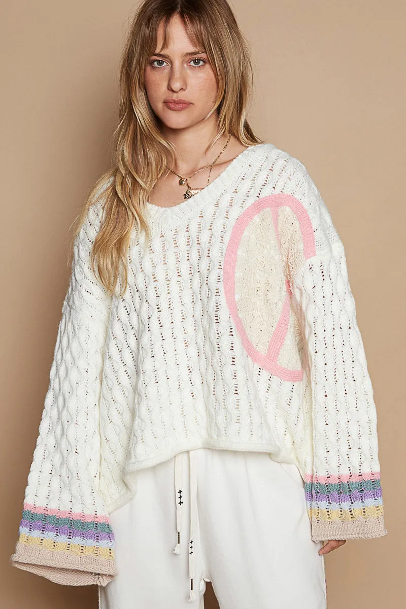 V-Neck Long Sleeve Relaxed Fit Acrylic Sweater with Crochet Patch and Color-Blocked Sleeves sold by BOLD elements