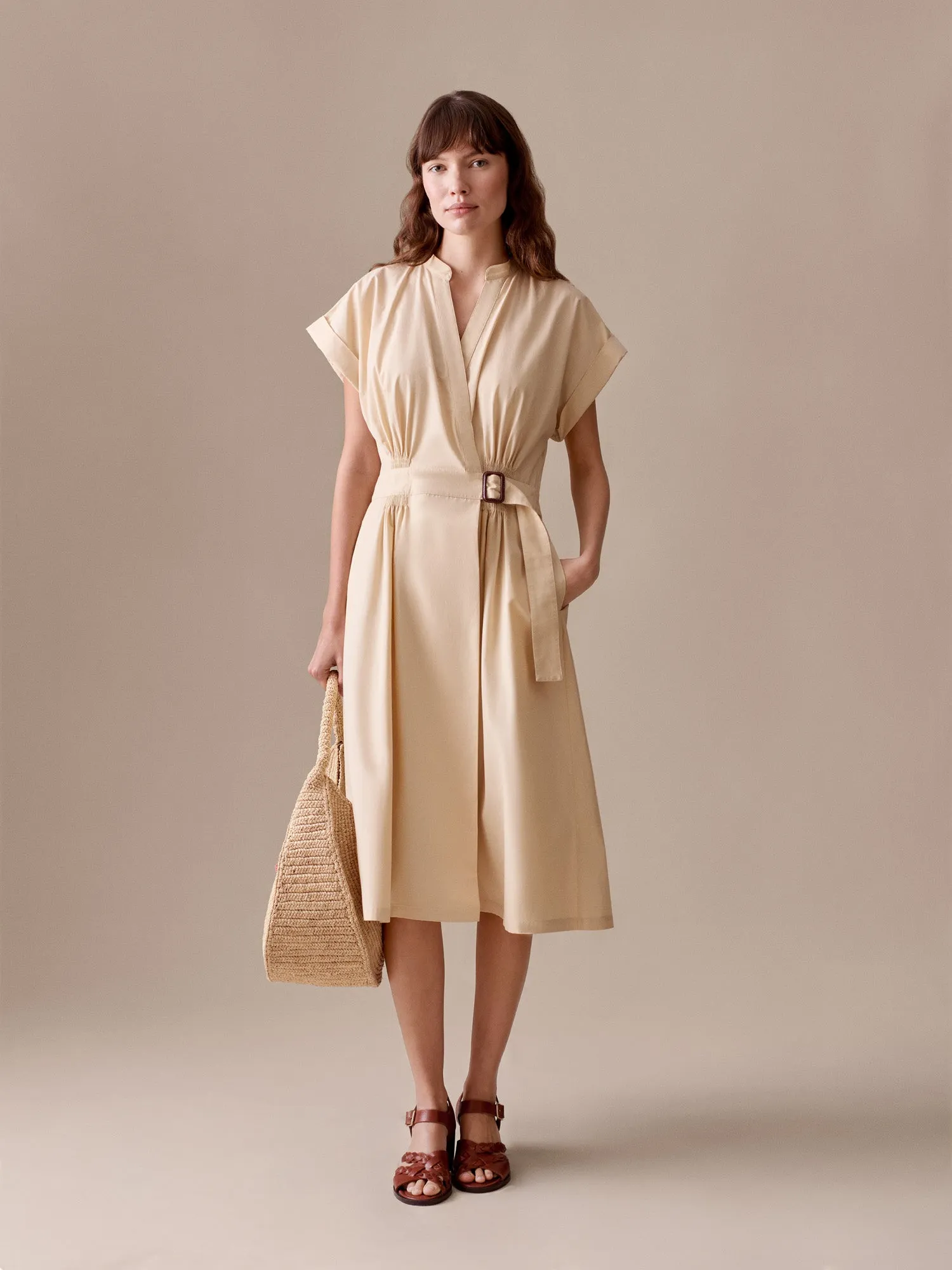 Robe Lohelia smockée en coton biologique sold by Bonpoint