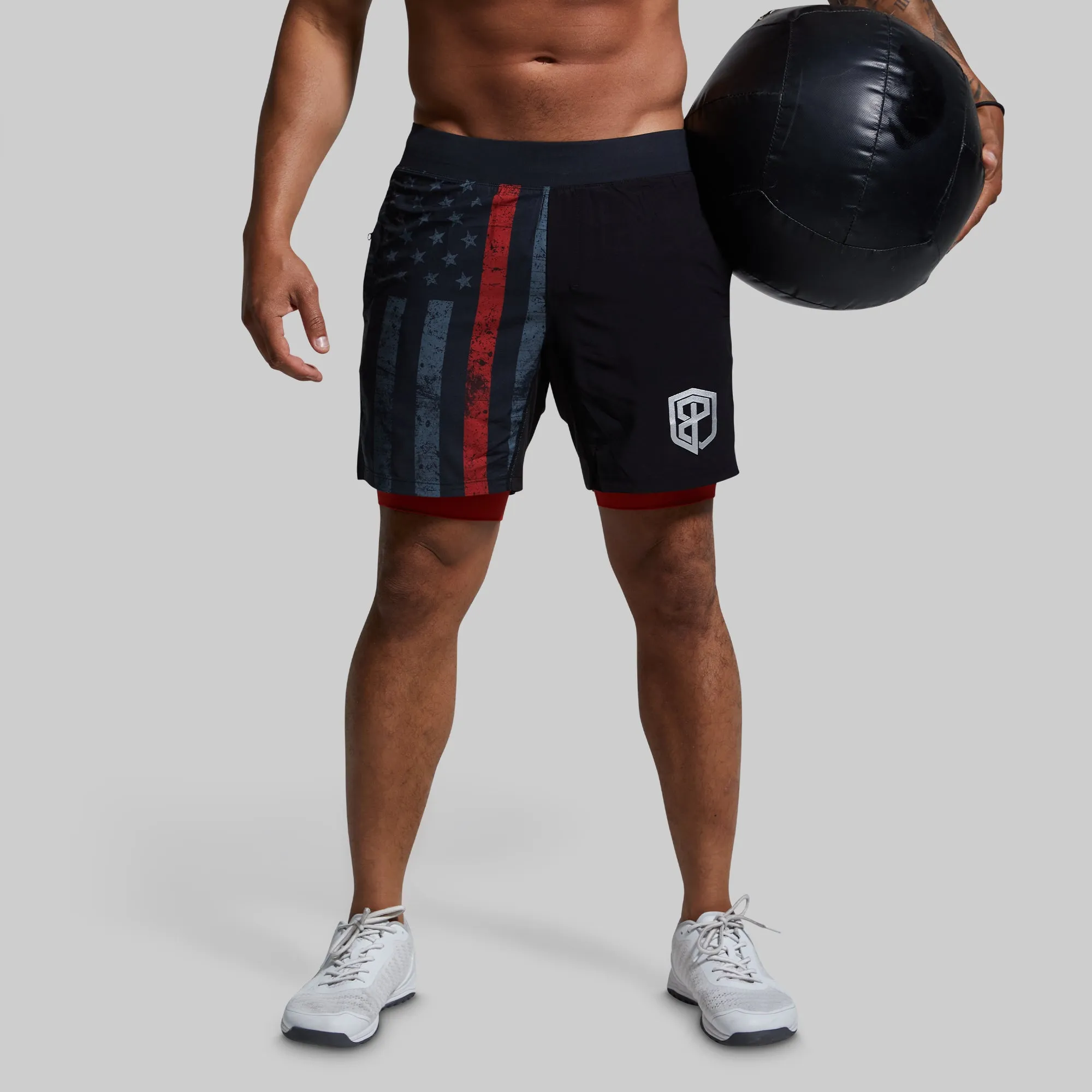 Versatile Short w/ Compression 7" (Thin Red Line Gunmetal) sold by Born Primitive