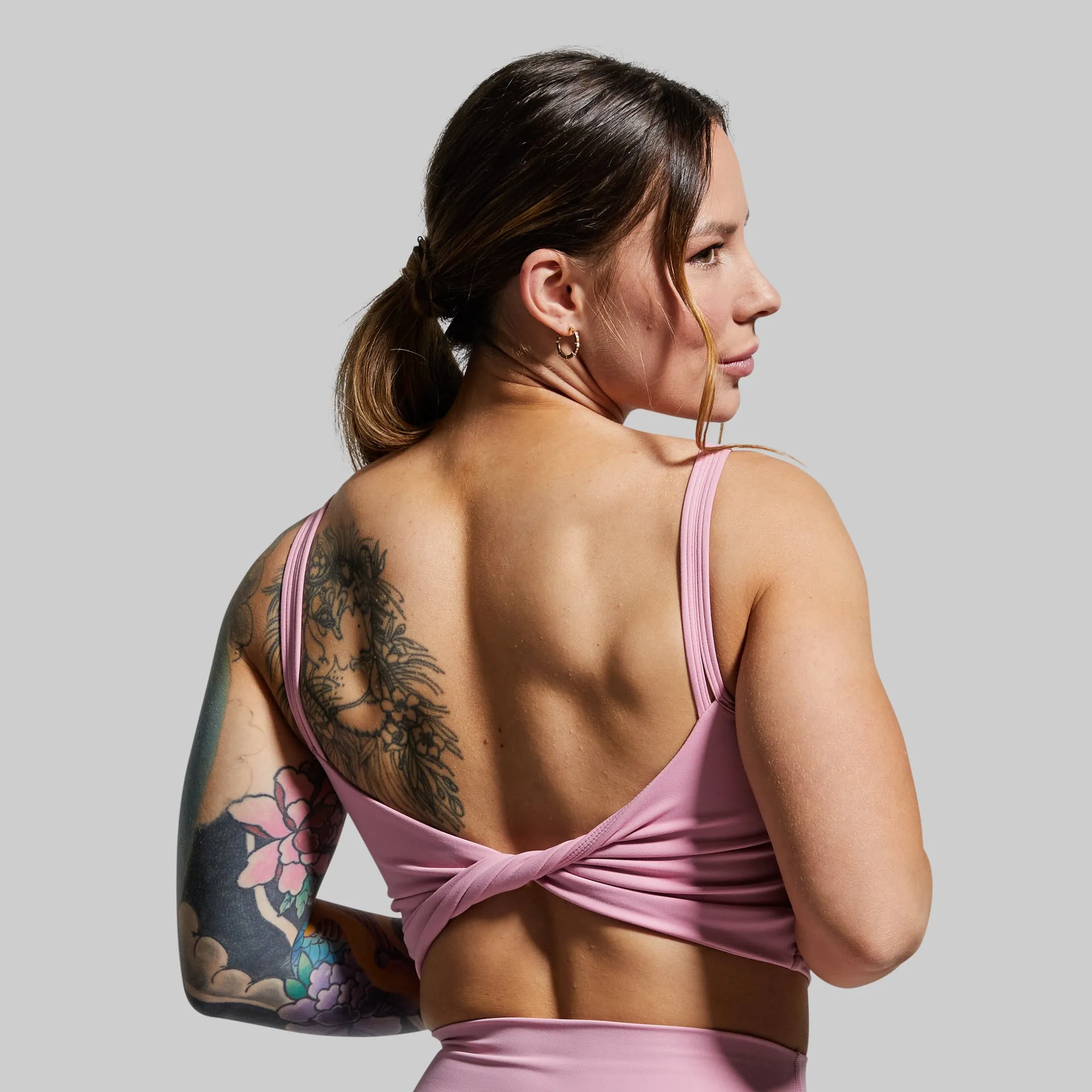 Don't Get It Twisted Sports Bra (Mystic Pink) sold by Born Primitive