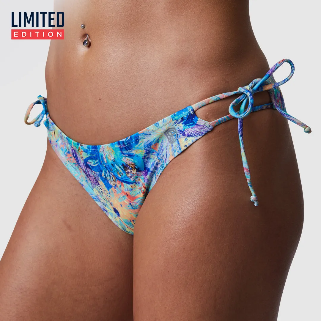 Heatwave Bikini Bottom (Iridescent Iris) sold by Born Primitive