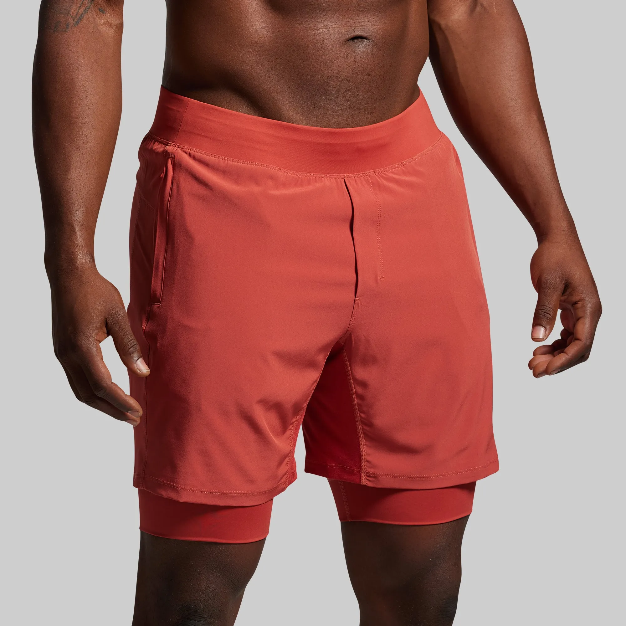 Versatile Short w/ Compression 7" (Brick) sold by Born Primitive