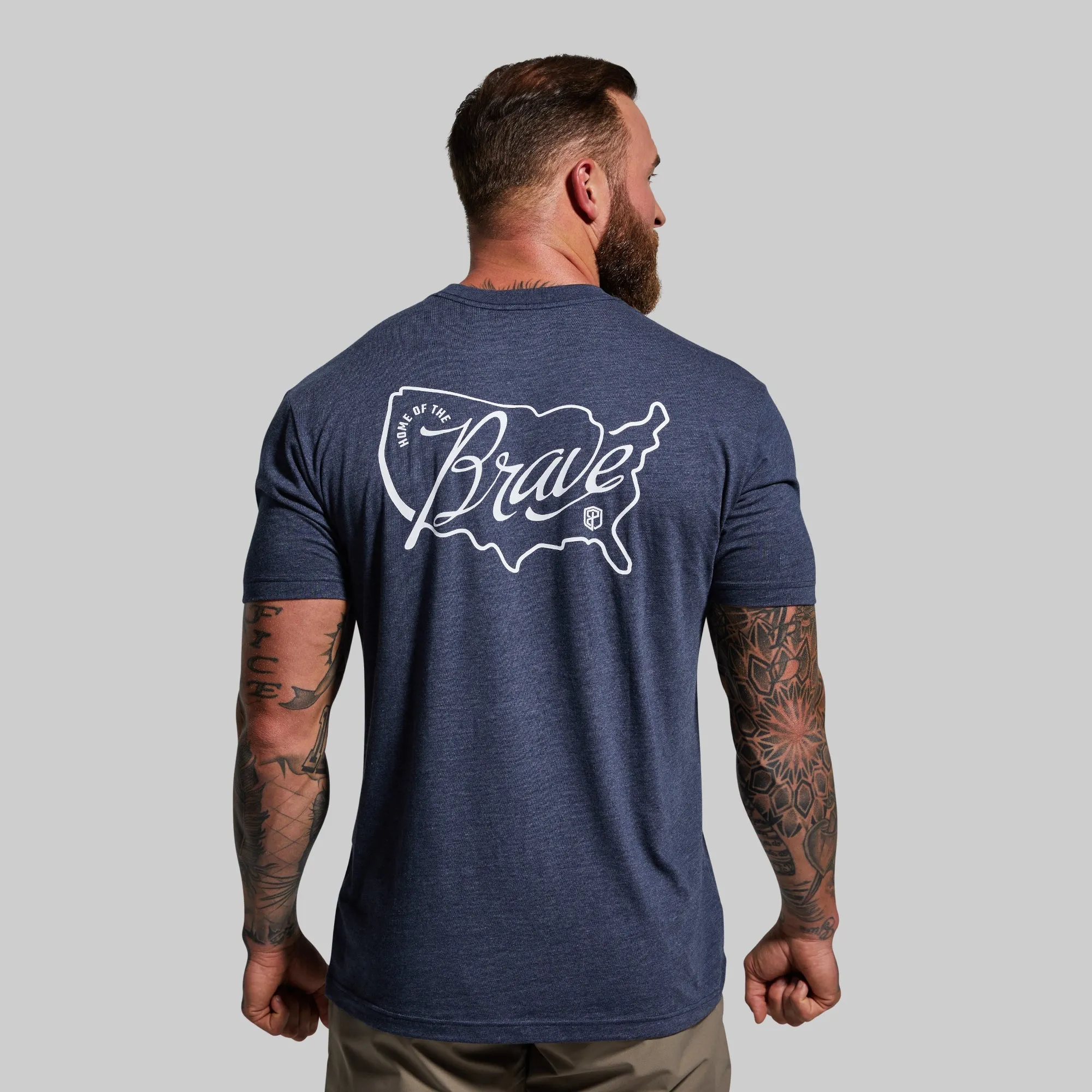 Home of the Brave Tee (Heather Navy) sold by Born Primitive