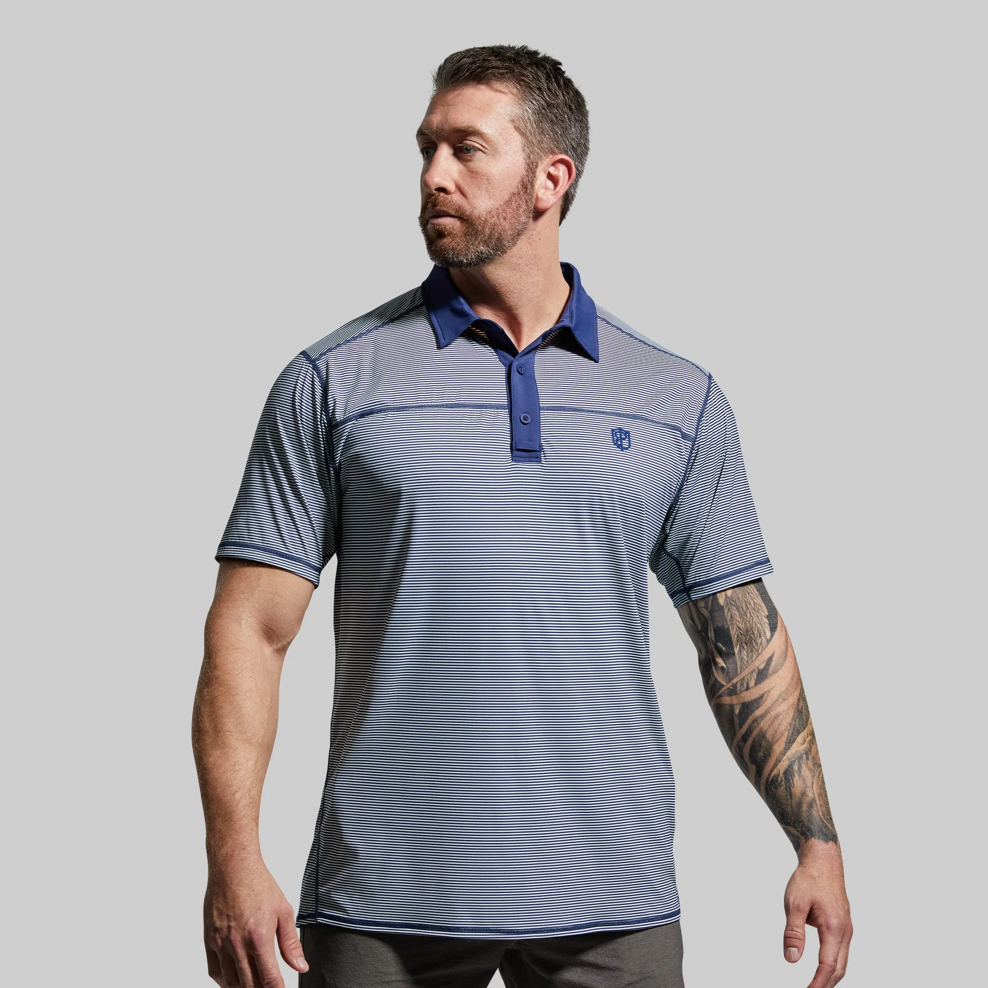 Men's Tek Polo (Midnight Blue Stripe) sold by Born Primitive