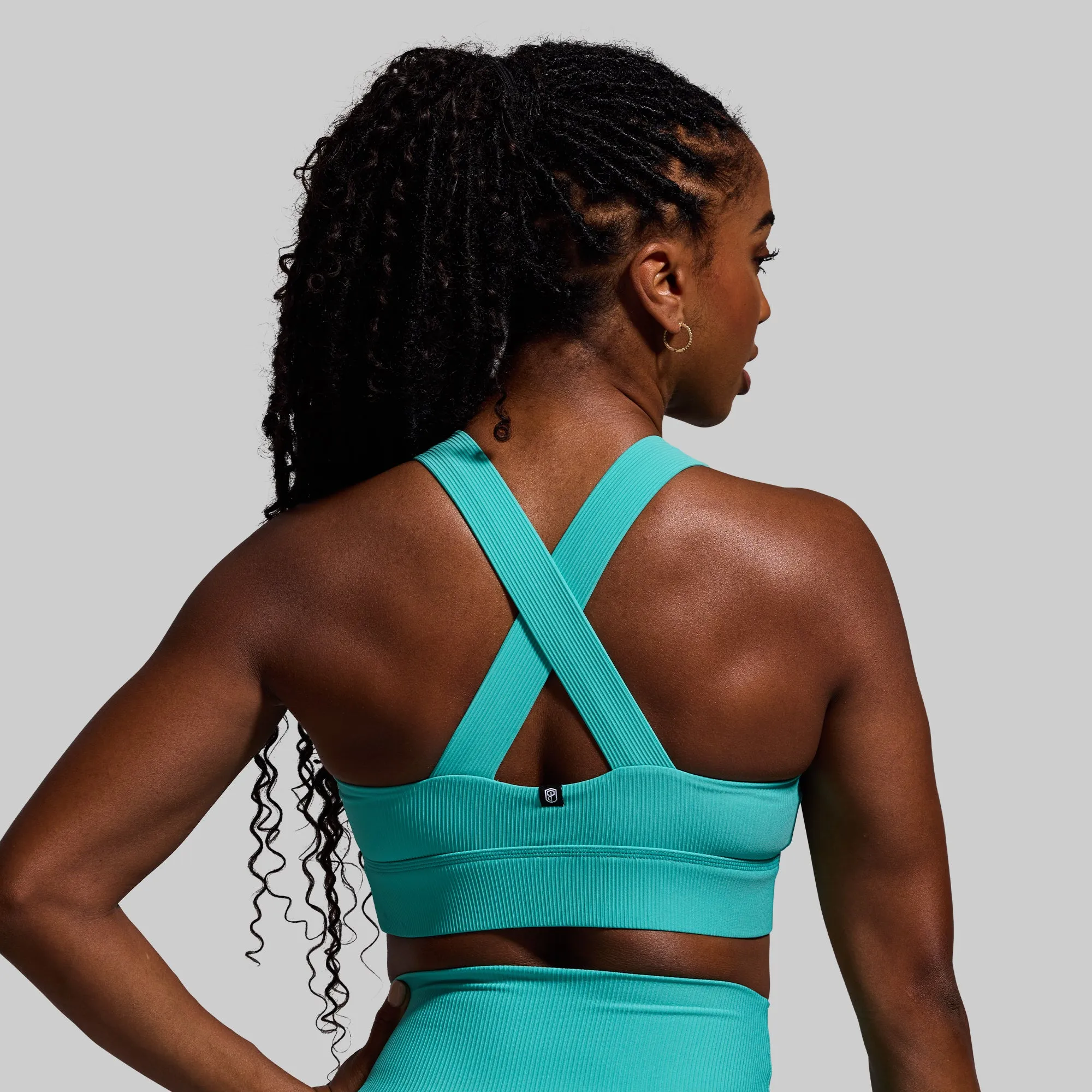 All or Nothing Sports Bra (Turquoise) sold by Born Primitive