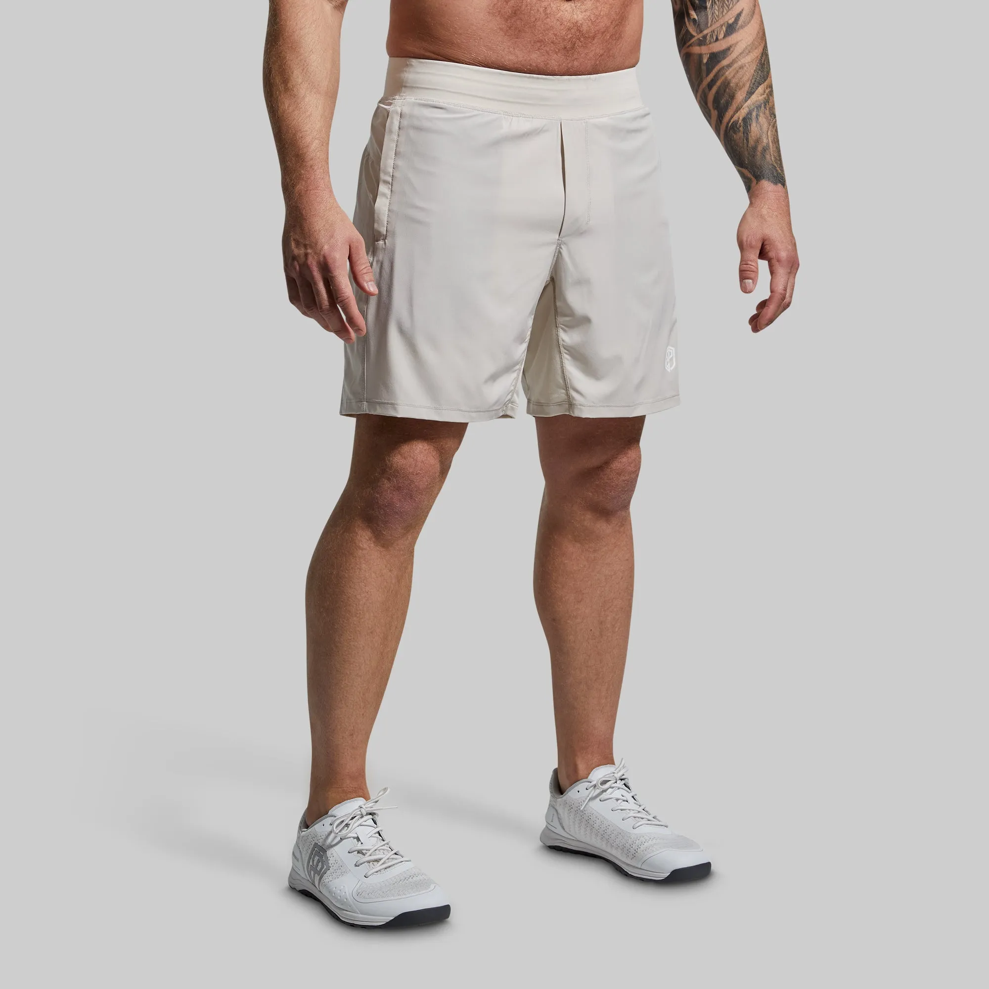 Versatile Short w/ Compression 7" (Sand) sold by Born Primitive