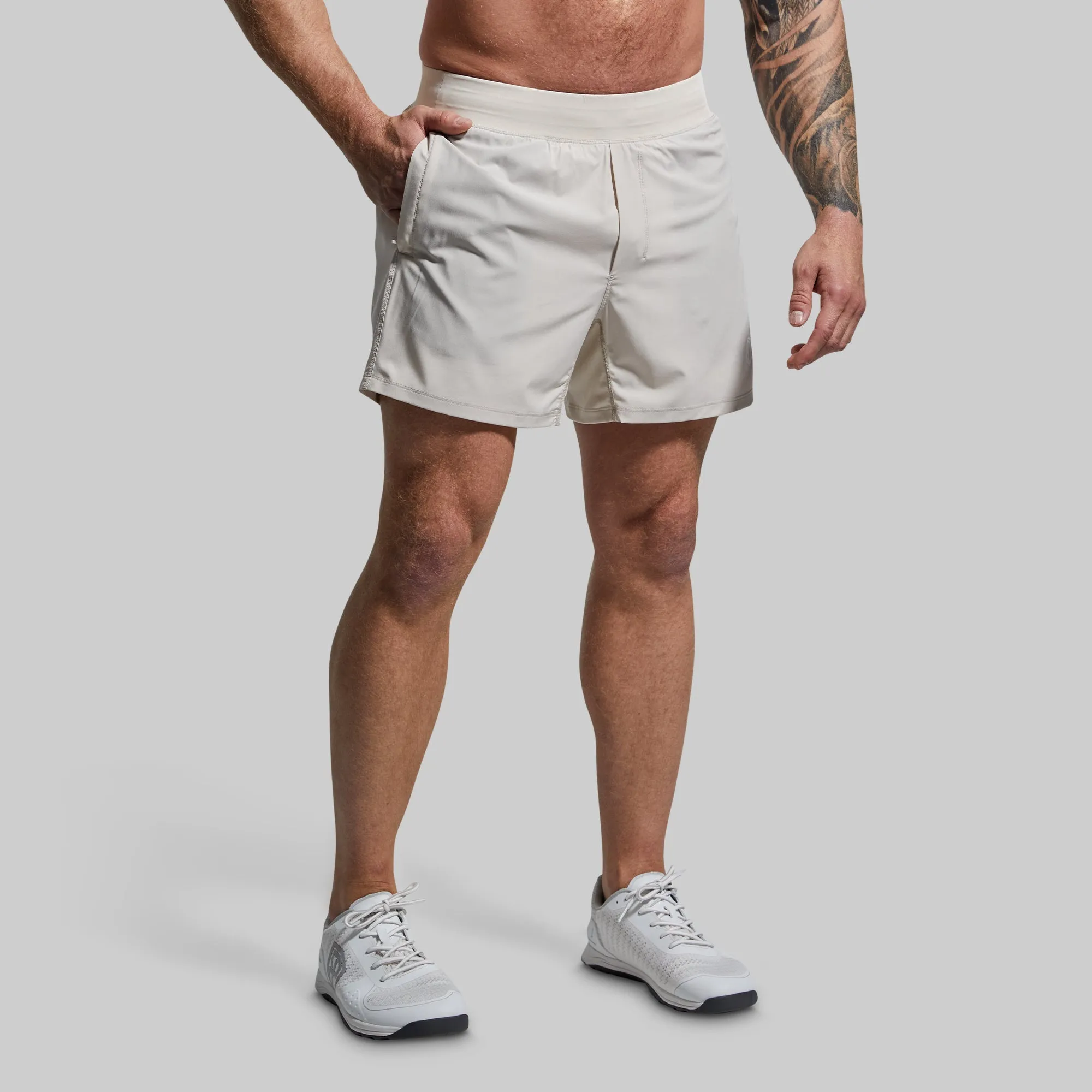 Versatile Short w/ Compression 5" (Sand) sold by Born Primitive